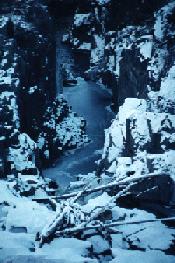 The Nepisiguit River in winter, snow on both banks