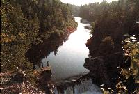 The Tetagouche River flowing between wooded banks